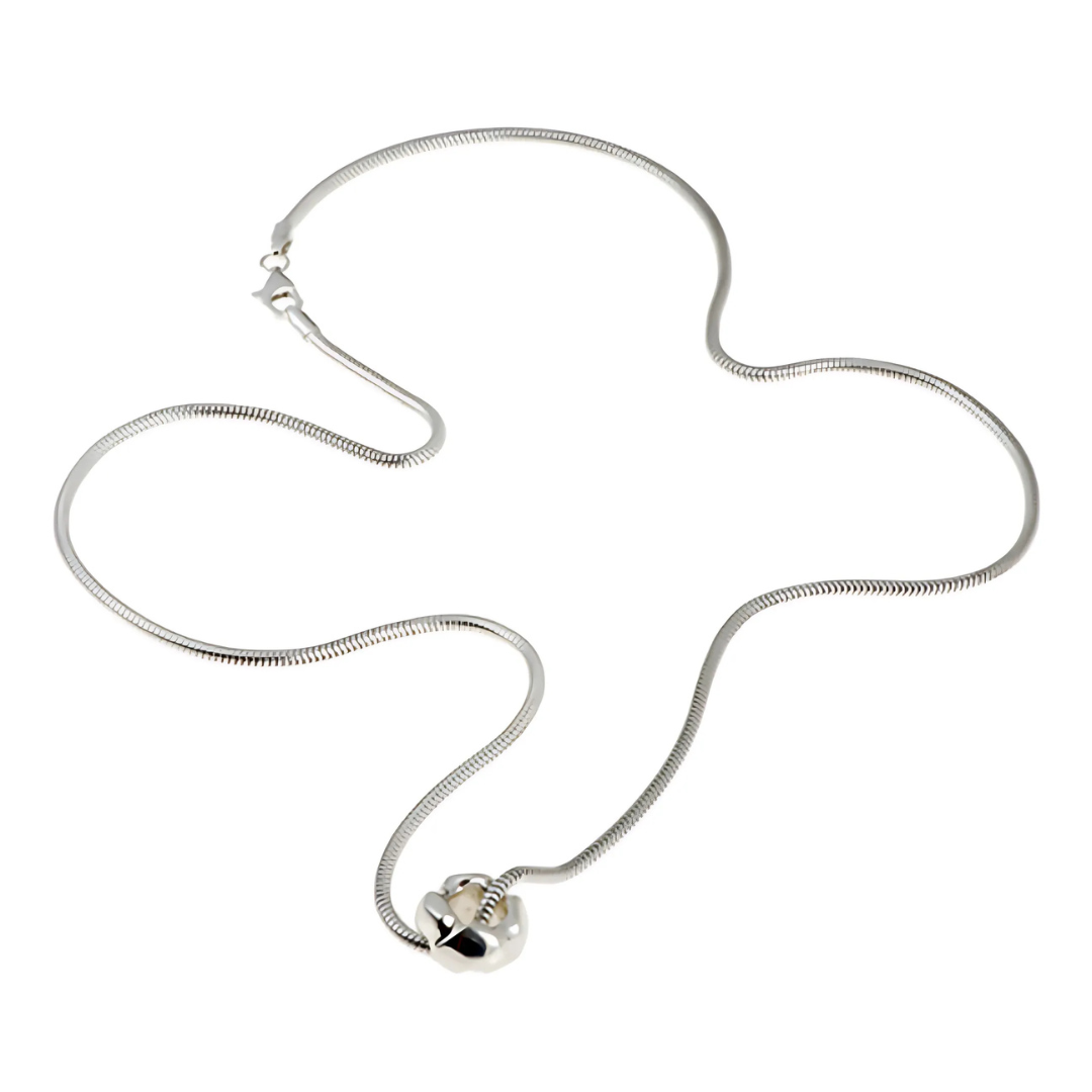 Carved silver donut necklace white background