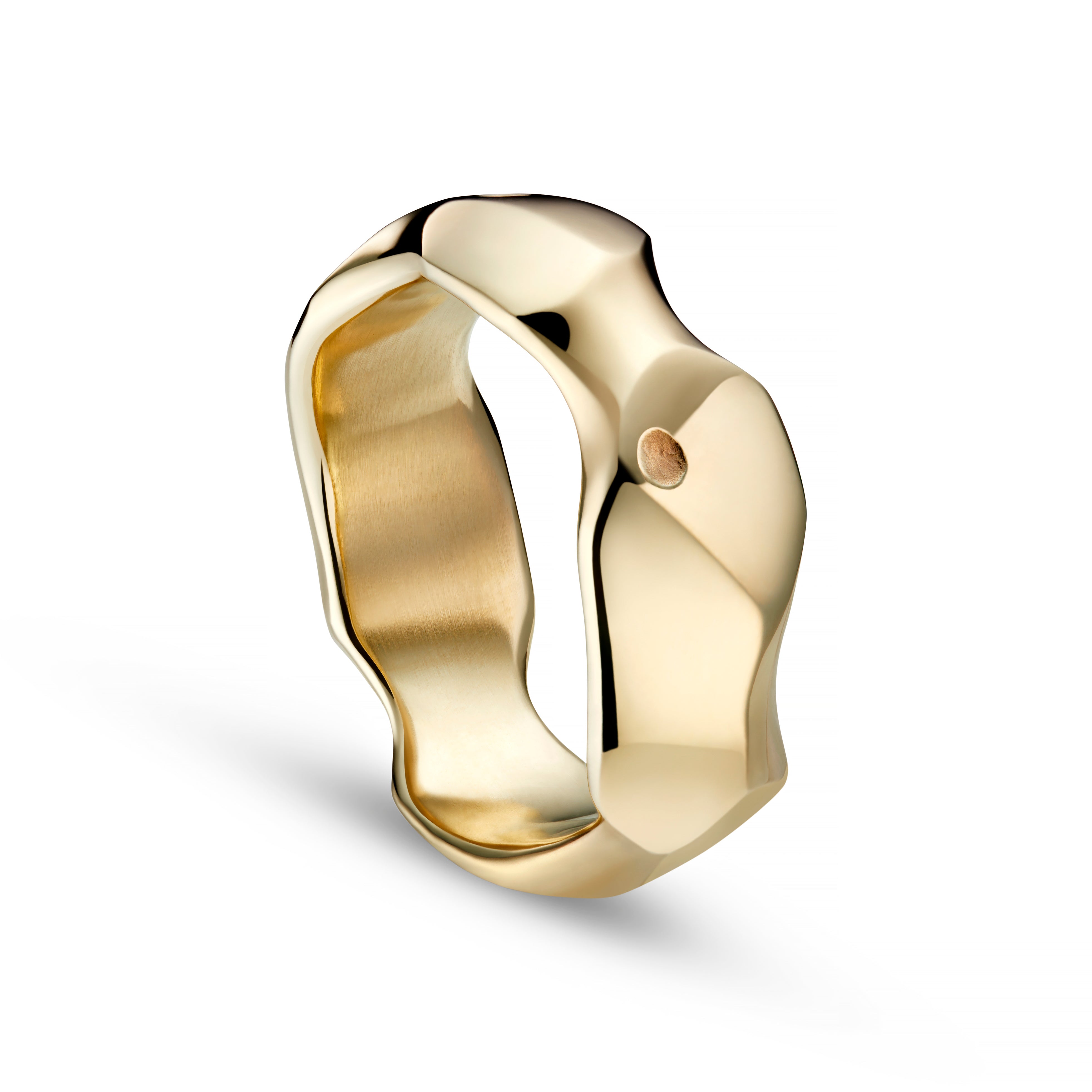 Yellow gold ring from Jeremy's Carved collection on a white background