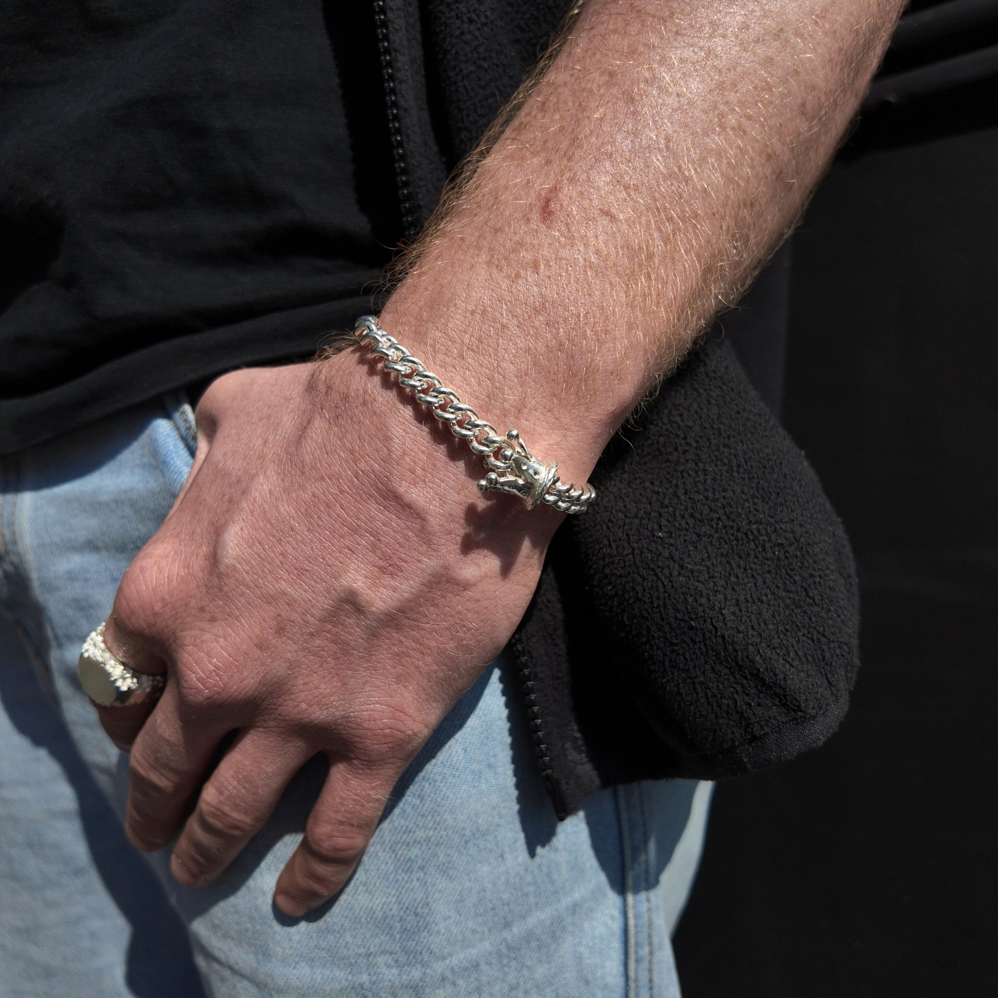 King & Queen Silver Crown Bracelet polished chain on wrist