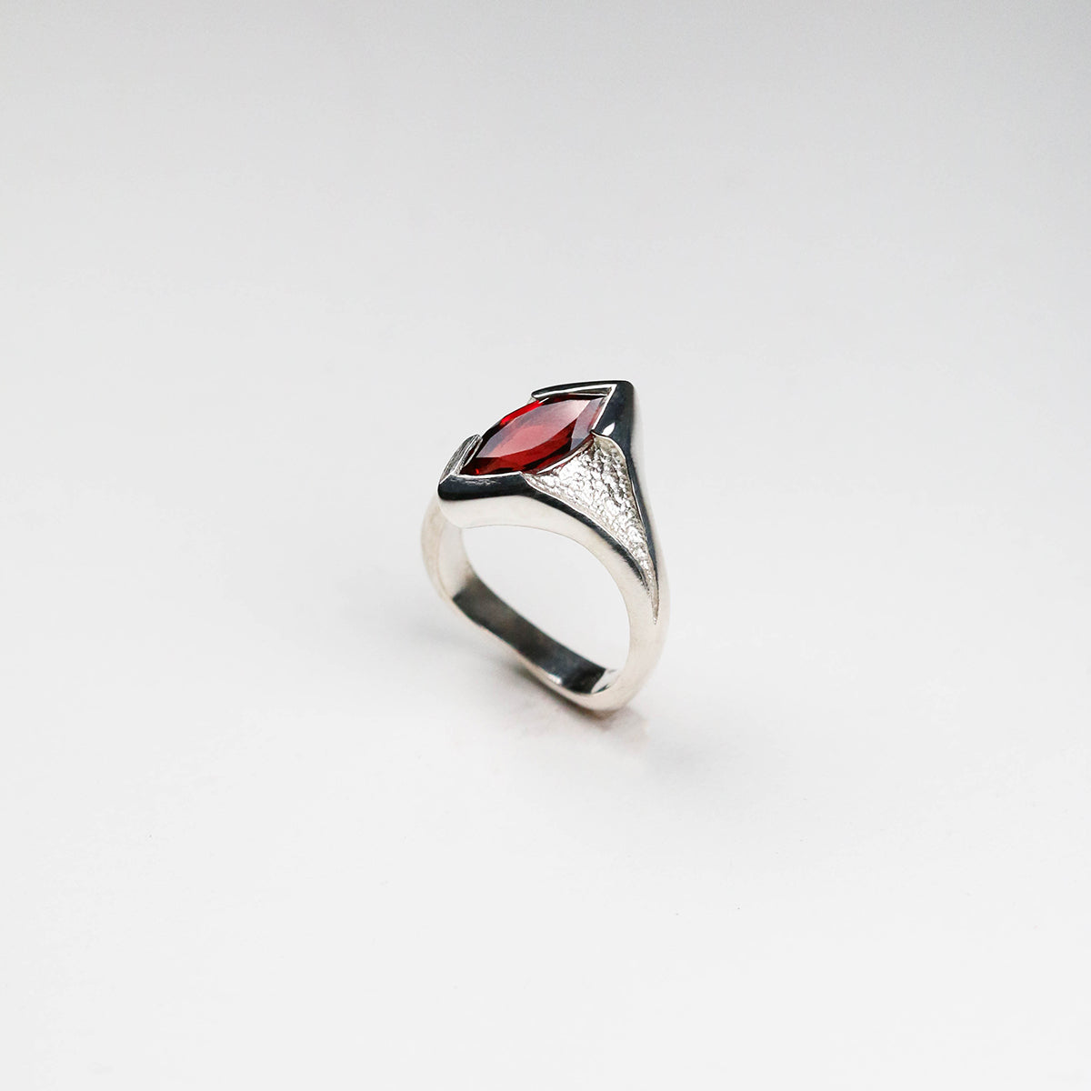 Made in Jeremy's signature asymmetric style, this unique design displays the marquise shaped Gemstone at an angle on the finger. A sleek and versatile piece, this cocktail ring is elegant, comfortable, and extremely flattering.