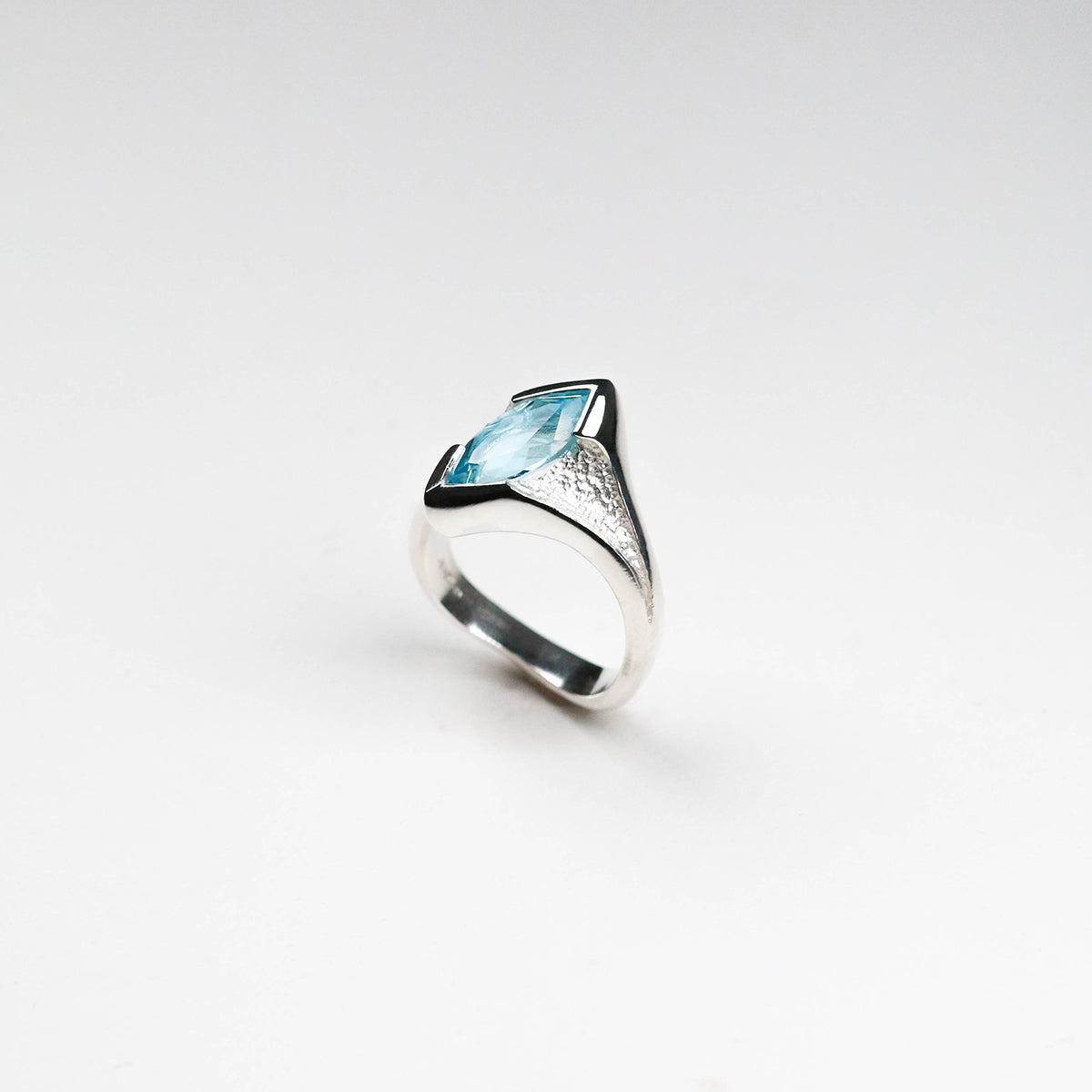 Made in Jeremy's signature asymmetric style, this unique design displays the marquise shaped Gemstone at an angle on the finger. A sleek and versatile piece, this cocktail ring is elegant, comfortable, and extremely flattering.