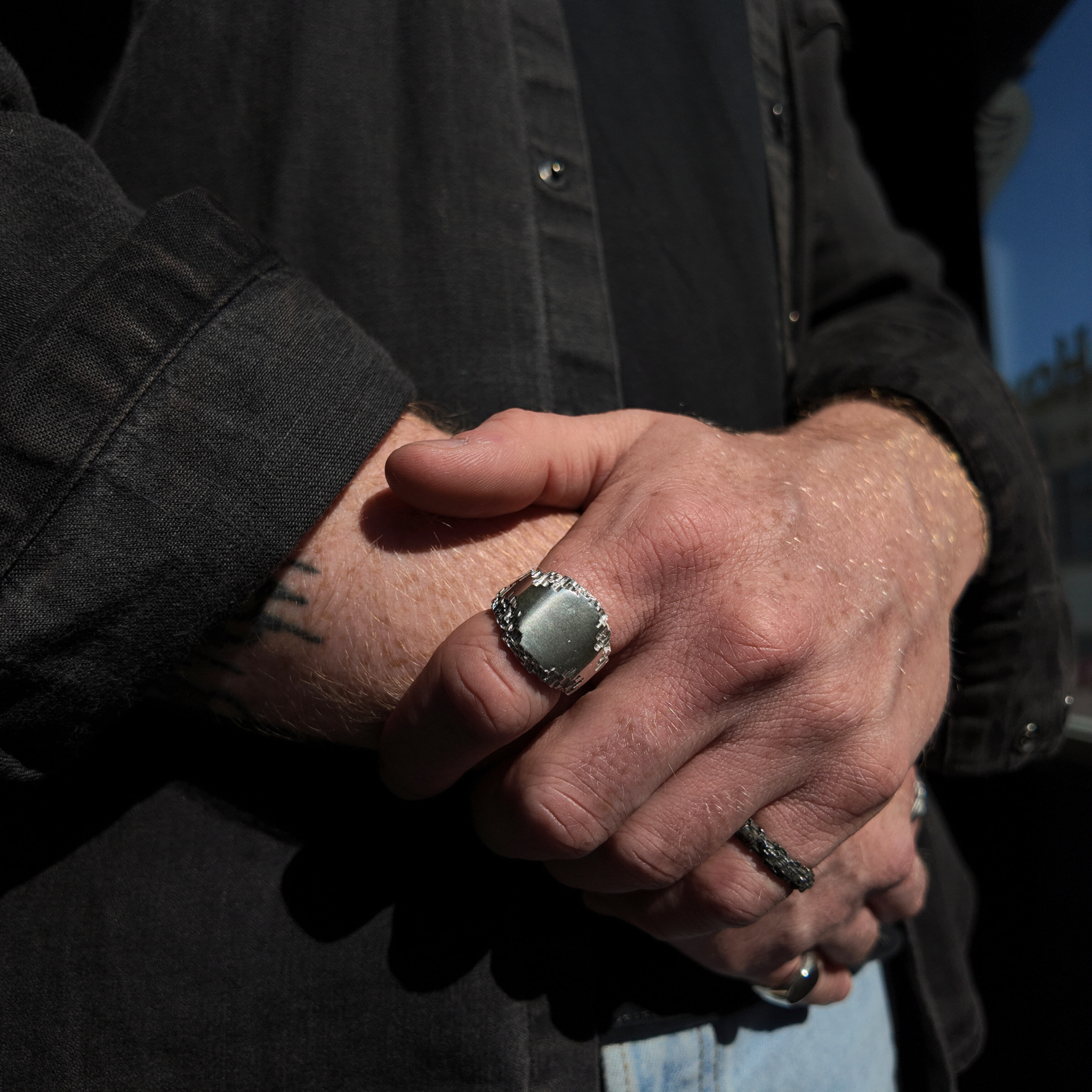 Luna large signet ring polished finish on a mans hand