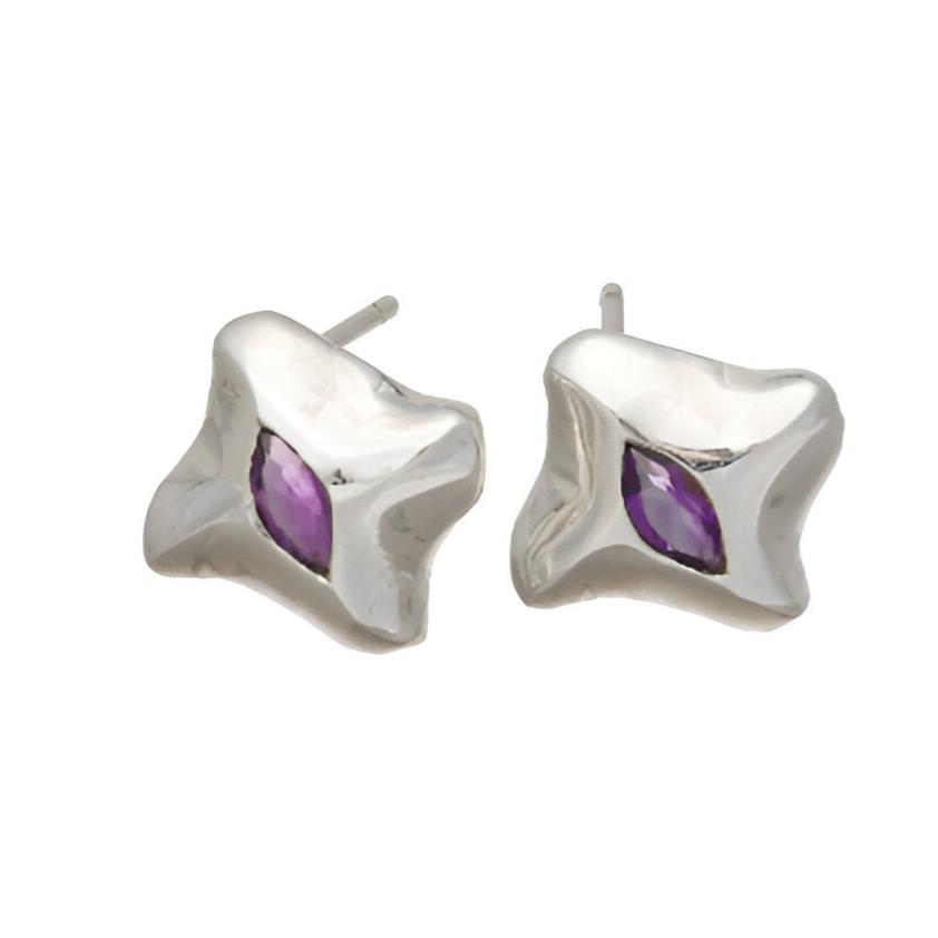 The earrings features a central marquise stone set in silver.
