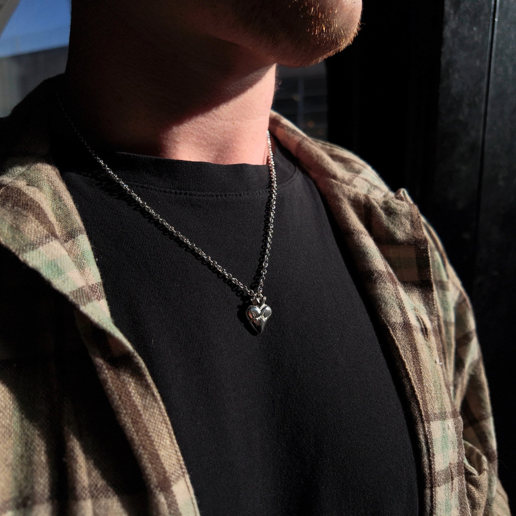 Sacred heart silver necklace polished finish around neck