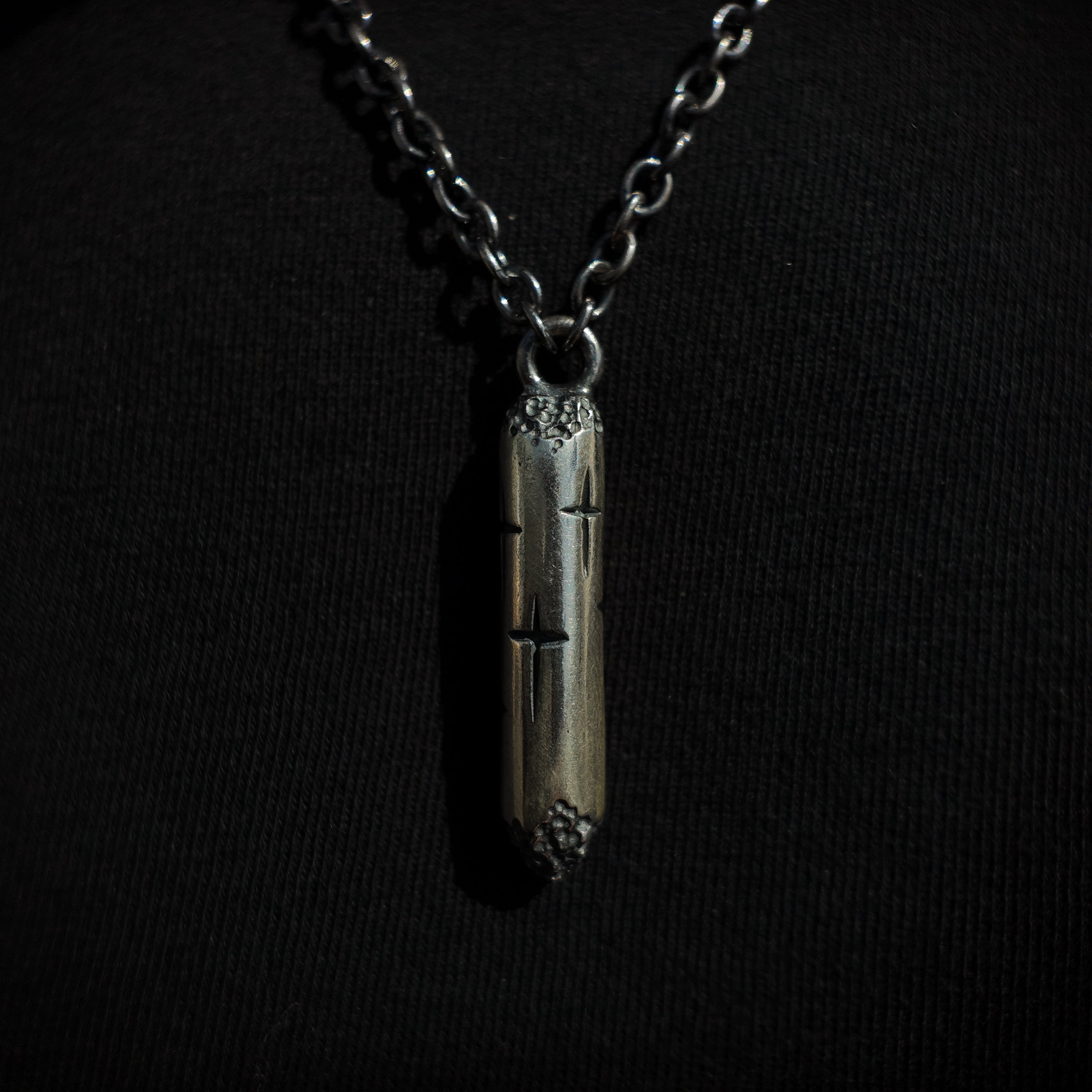 Trinity small silver cylinder necklace macro shot