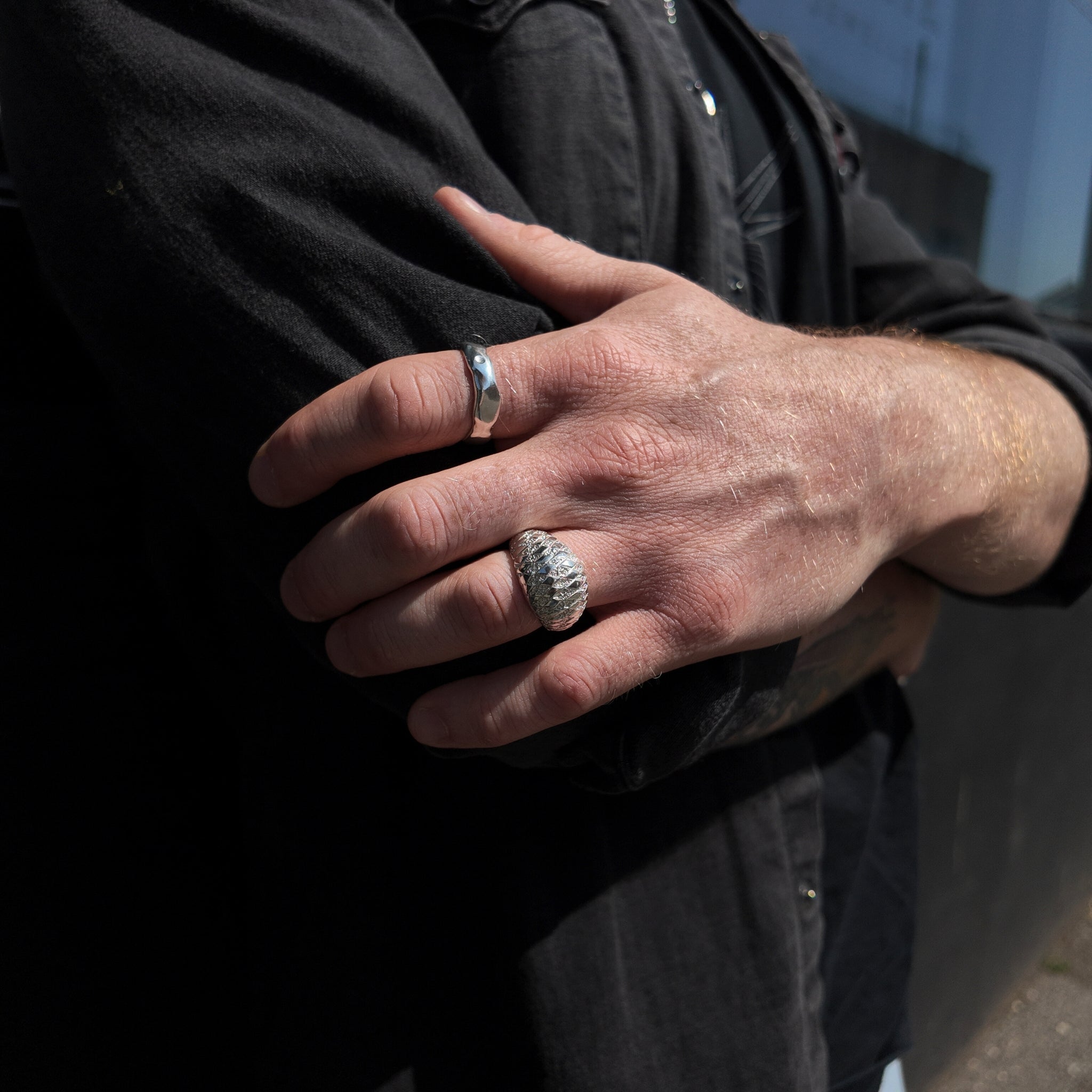 chequered bombe and carved medium ring handshot hand on atrm