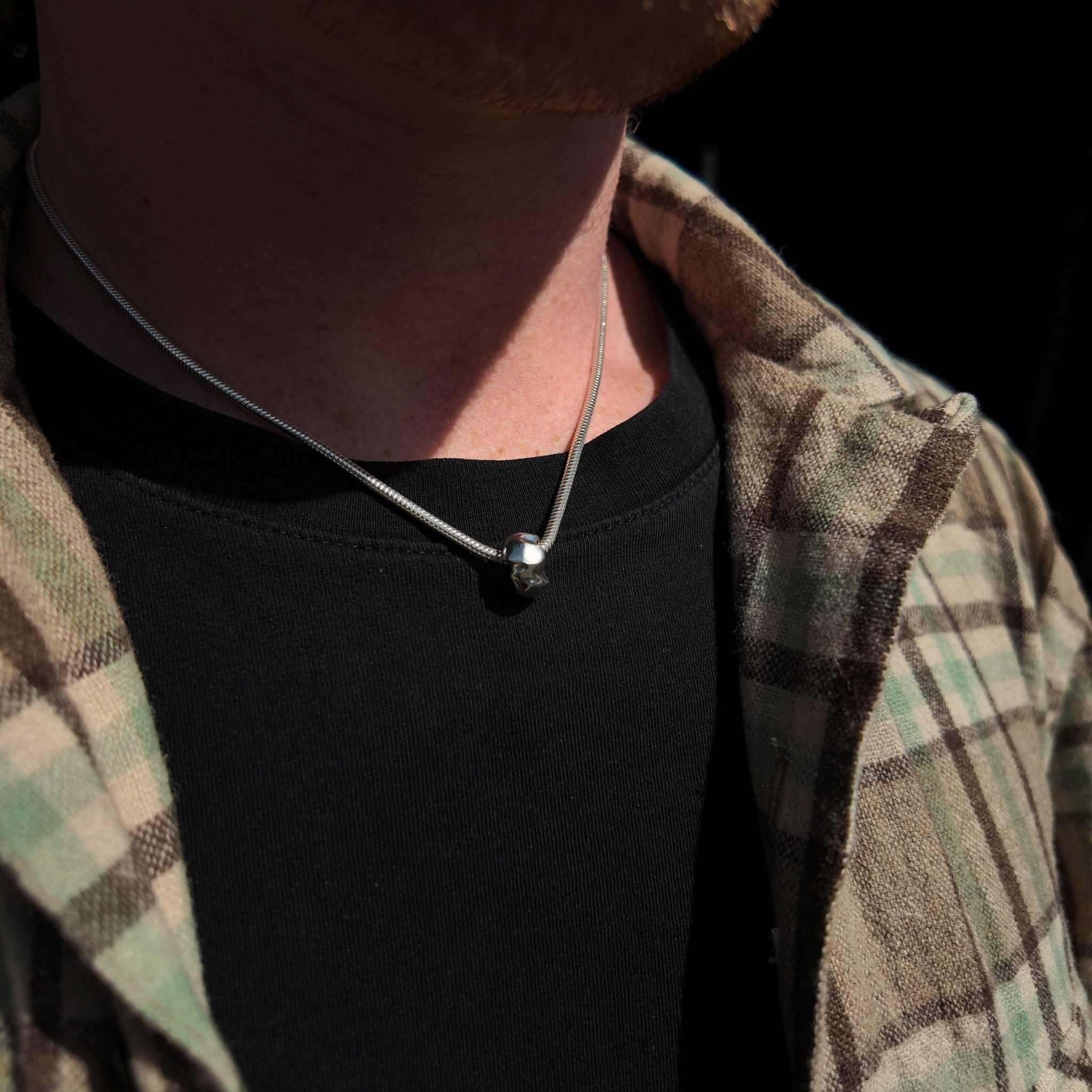 Carved Silver Donut Necklace