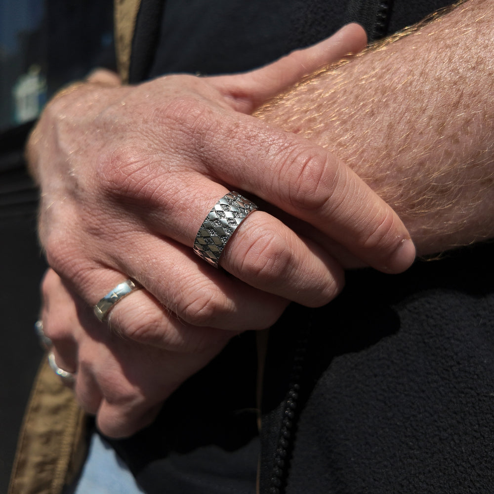 Chequered_silver_square_ring_oxidised_handshot.jpg