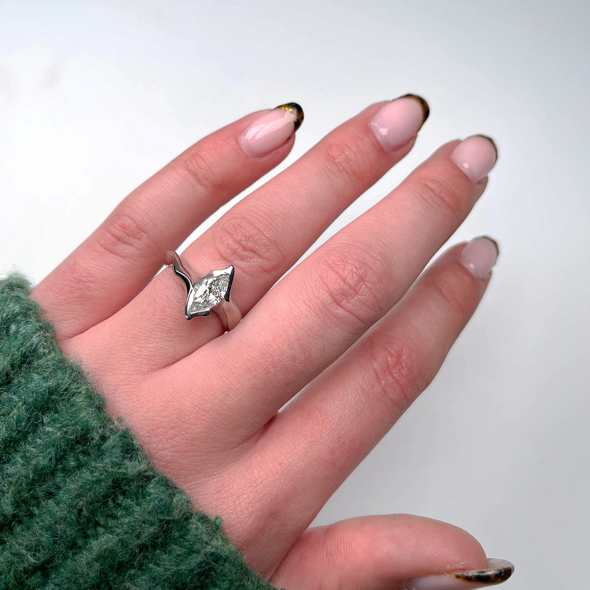 Marquise diamond wedding ring on hand