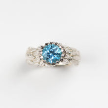 Feathers Sky Blue Topaz Silver Ring