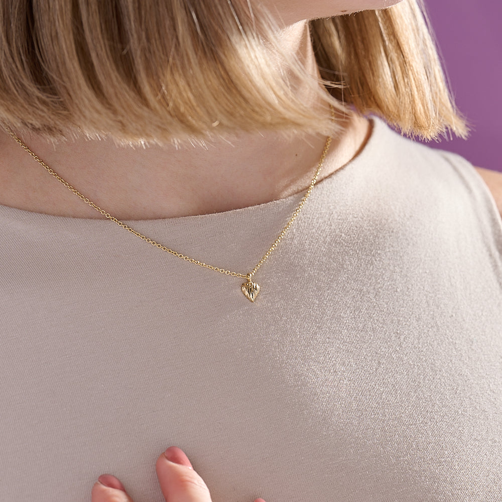 Crafted exclusively in 9ct yellow gold, these pieces are the smallest yet in Jeremy's repertoire. 