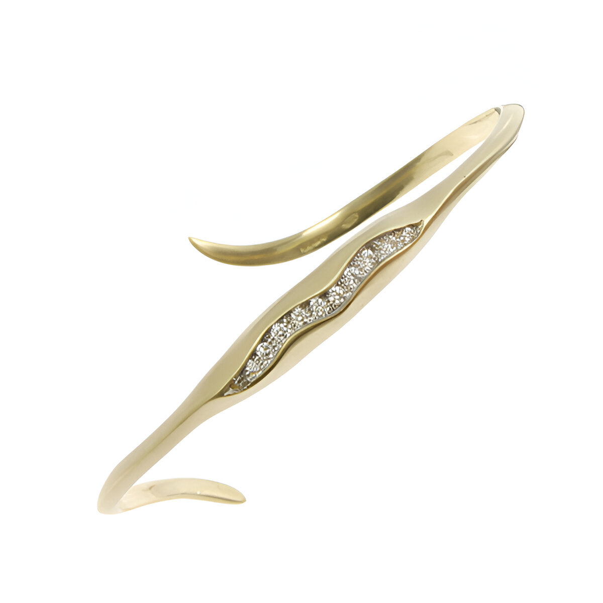 This bracelet is handmade in 18ct gold and pavé set with 12 white diamonds that total .20pts.