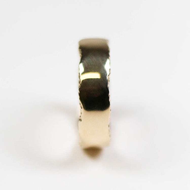 Trinity textured edge ring measuring 6mm in width in 9ct yellow gold.
